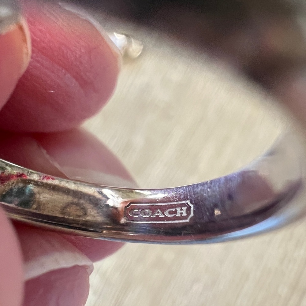 COACH Sterling Silver Filigree OP Art Signature Dangle Ring
Style 94770 - Picture 3 of 4